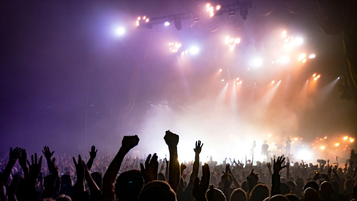 Concert crowd cheering, a stock photo illustrating the Destiny's Child reunion at Jay-Z's show