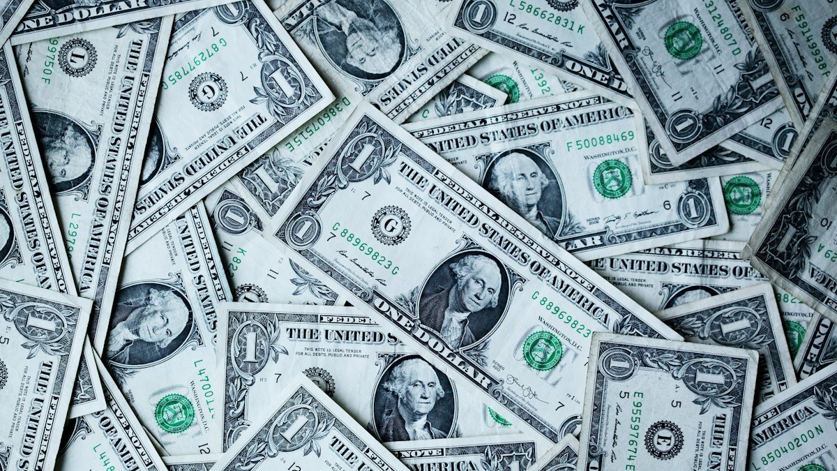 US dollar banknotes, a stock photo illustrating the Fed rate outlook